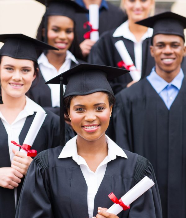 group of college students in graduation gown